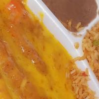 Enchiladas Mexicanas · Beef or cheese or chicken, served with Guajillo sauce, fresh Mexican white cheese, sour crea...