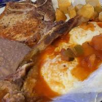 Pork Chop Plate · Pork chops plate, sauce on top, rice, beans, salad & guacamole.