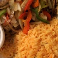 Steak Fajita · Includes steak, grilled onions, green peppers, and red peppers.