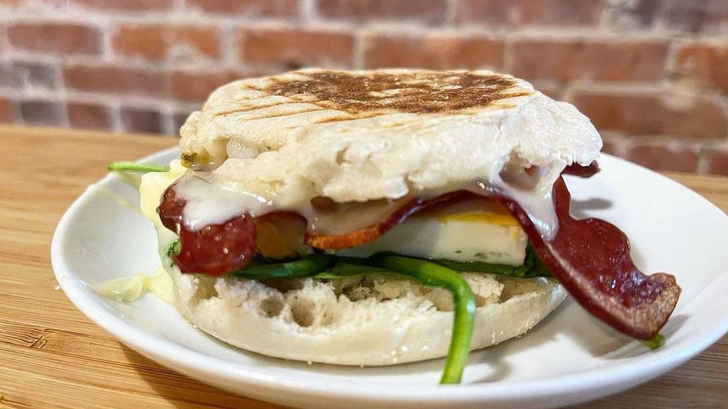 Grilled Caprese Sandwich · Freshly sliced tomato, basil, and mozzarella cheese grilled and melted to perfection.
