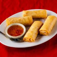 Crispy Spring Rolls (4) · Fried roll of glass noodle mixed with vegetables, served with sweet and sour sauce.