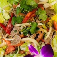 Thai Salad · Grilled meat with thai seasonings on top vegetable.