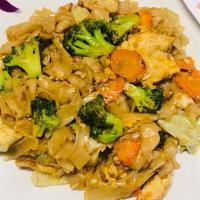 Pad See Ew · Stir fried wide rice noodles, egg, cabbage carrots and broccoli.