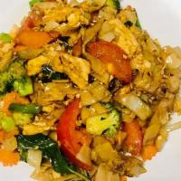 Drunken Noodles · Stir fried wide rice noodles, onion, tomatoes, celery, carrot, broccoli and basil.