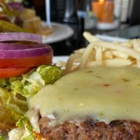 The Impossible Burger · An 8 oz. portion of a plant based patty, hardwood grilled, topped with Pepper Jack cheese, a...