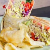 Chakra Wrap · Flour tortilla filled with hummus, quinoa, red peppers, avocado, tomato, spinach, cabbage, a...