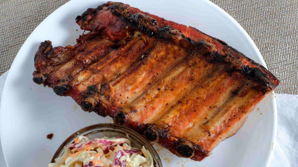 We Love Ya Baby Back Ribs · Slow smoked ribs cooked to perfection with our own rub (Full Rack)
