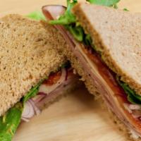 California Cobb Sandwich Combo · Turkey, crisp bacon, avocado, bleu cheese spread, green leaf lettuce, tomato and red onion o...