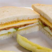Kid'S Grilled Cheese Sandwich · A slice of cheddar cheese and a slice of swiss cheese grilled on your choice of bread. Add a...