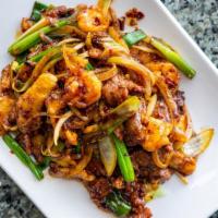 Mongolian Triple · Spicy. Chicken, shrimp and beef.