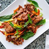 Crying Tiger Lunch · Spicy. Grilled sliced beef tossed with basil, carrot, onion in a chili pepper sauce.