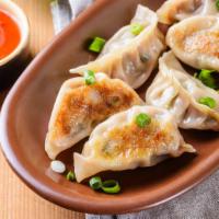 Fried Dumplings · 6 piece. Choice of chicken or vegetable.