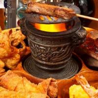 Pu Pu Platter For 2 · A fantastic sampler with our favorite picks! Beef skewers, coconut shrimp, spare ribs, chick...
