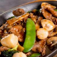 Sizzling Beef And Scallops · Served in sizzling platter with mushroom and onion.