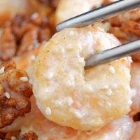 Walnut Prawns · Lightly breaded shrimp in lemon mayonnaise cream sauce.