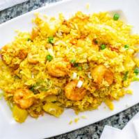 Thai Fried Rice · Curry flavor rice stir-fried with shrimp, pineapple, egg, cashews and vegetables.