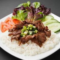 R4 Grilled Lemongrass Beef Over Rice · Grilled lemongrass beef served over jasmine rice with tomato, cucumber, onion, and fresh gre...