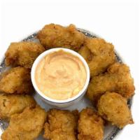 Chicken Bites-10 Pieces · Crispy and breaded to perfection. These pieces of heaven come with two sauces. You can alway...