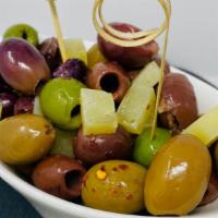 Warm Olives & Manchego · Marinated 5-types olives, Young Manchego, red pepper flakes. The perfect nibbler.