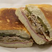 Cuban Sandwich · w/Roast Pork,Ham, Swiss Cheese  and Pickle,Lettuce and Tomatoes included