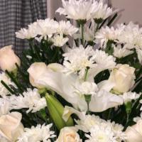 Honor · white roses with lily's, white fillers and greens