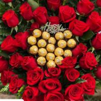 Redlove · A beautiful heart shape made with 50 red roses and Ferrero chocolates