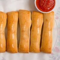 Bread Sticks · Served with four pieces.