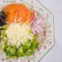 Fresh Garden Salad · Lettuce, tomato, green peppers, onions, black olives, and cheese.