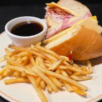 Club Dip · Our popular club sandwich with turkey, ham, American and Swiss cheese, and bacon toasted on ...