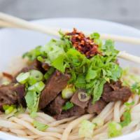 Cold Beef Vinaigrette Noodle · Served with a zesty garlic vinaigrette! Our fresh, springy noodles are glowing with slow-bra...