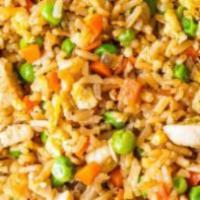 Chicken Fried Rice · Five spice wok fired chicken confit with rice, carrot, mushrooms, bok choy, corn, sun dried ...