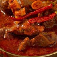 Lamb Tikka Masala · Tangy tomato sauce, house spices.