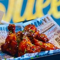 Wings · 6 jumbo wings tossed in your choice of sauce