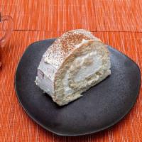 Persian Rollet · Vanilla-soaked cake filled and rolled with fluffy homemade whipped cream.