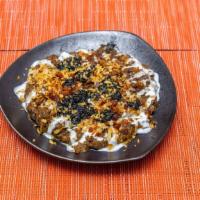 Kashk-O-Bademjan · Vegetarian option. Smashed fried eggplant and garlic topped with fermented yogurt, walnuts, ...
