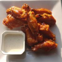 6 Wings · Tossed in your choice of sauce or rub.