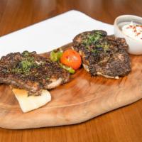 Grilled Chicken · Grilled young airline-chicken breast marinated in zaatar, sumac and olive oil, served with g...