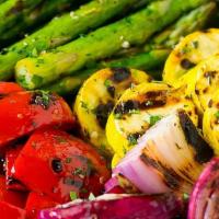Grilled Vegetables · Colorful assortment of mixed grilled veggies tossed with jerk spices & olive oil.