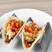 Street Tacos · California seasoned chicken, cabbage slaw, sliced avocado, fresh cilantro, chili aioli