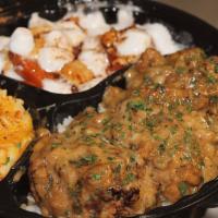 Turkey Necks Dinner · Southern Style Smothered Turkey Necks served over white rice. Served with 2 sides of your
ch...