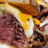 Panther’S Classic Reuben · Choice of corned beef, pastrami or turkey on toasted rye with melted Swiss cheese, sauerkrau...