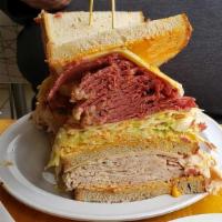 A Bird To The Wise · Corned beef and fresh turkey with Russian dressing and coleslaw.