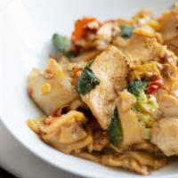 Drunken Noodles · Medium. Flat rice noodles sautéed in flavorful spicy basil brown sauce with eggs, broccoli, ...