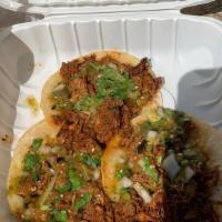 Three Tacos · Your choice of chorizo, carnitas or steak.
