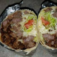 Burrito Especial · One beef burrito with sauce, topped with cheese, lettuce and sour cream.