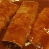 Enchiladas Supreme · One chicken, one bean, one cheese and one beef enchilada.