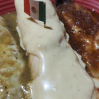 Enchiladas Rancheras · Two cheese enchiladas topped with pork, cooked with tomatoes, onions, bell peppers and enchi...
