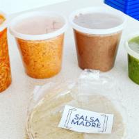 Taco Kit · Includes: 32 oz meat, 16 oz salsa (your choice), 24 oz rice, 24 oz Beans (Black or pinto), 8...