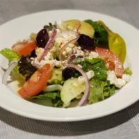 Greek Salad · Gluten-free. Combination of romaine, green leaf, and iceberg lettuce, tomato, cucumber, red ...