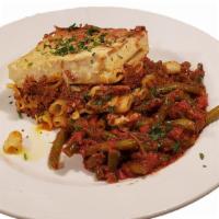 Pastitsio · Baked pasta dish, layered with ground beef, cheese, and topped with béchamel, served with fa...
